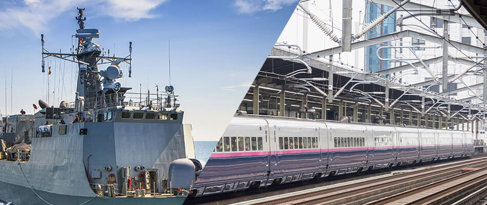 Marine vessel with antennas for radio network communication juxtaposed with electric train connected to electric network.