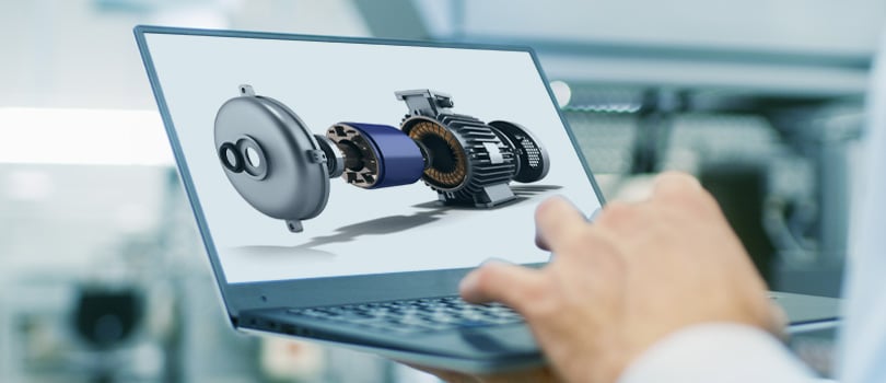 Person holding a laptop showing a 3D simulation of an exploded electric motor.